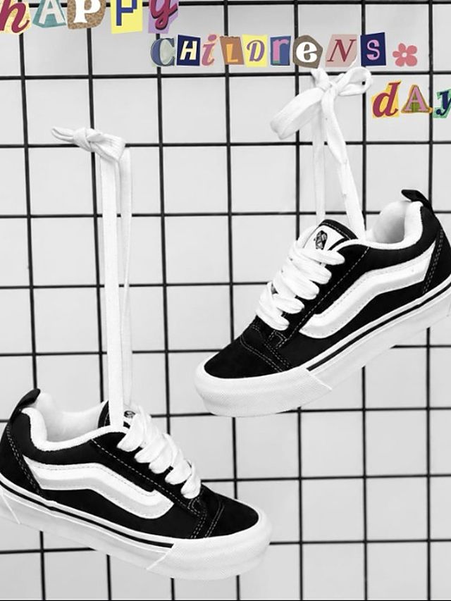 Zapatillas Vans blancas y negras